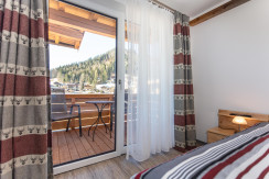 Schlafzimmer mit Sitzgruppe