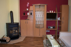 Wohnbereich mit Kachelofen Wohnbereich mit Kachelofen