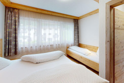 Ferienwohnung-Hinterholzer-Bedroom 9
