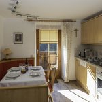 Photo of Apartment for six persons | © App III Küche mit Esstisch