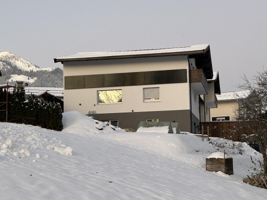 Frana Appartements im Winter bei Sonnenuntergang