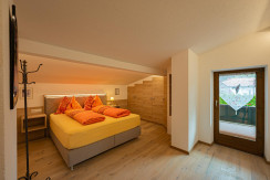 Schlafzimmer mit Doppelbett im Ferienhaus Konrad Schlafzimmer mit Doppelbett im Ferienhaus Konrad